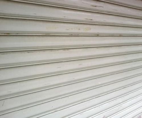 解構造大港區保溫卷簾門維修難題 廠家直銷與天津建材全解讀